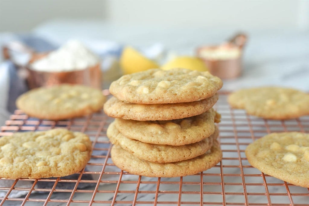 stack of Lemon White Chocolate Chip cookies on cooling rack