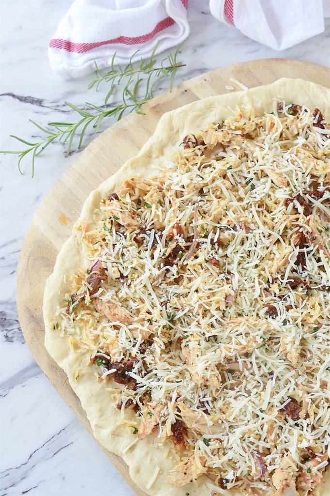 Rosemary Chicken Pizza on pizza paddle