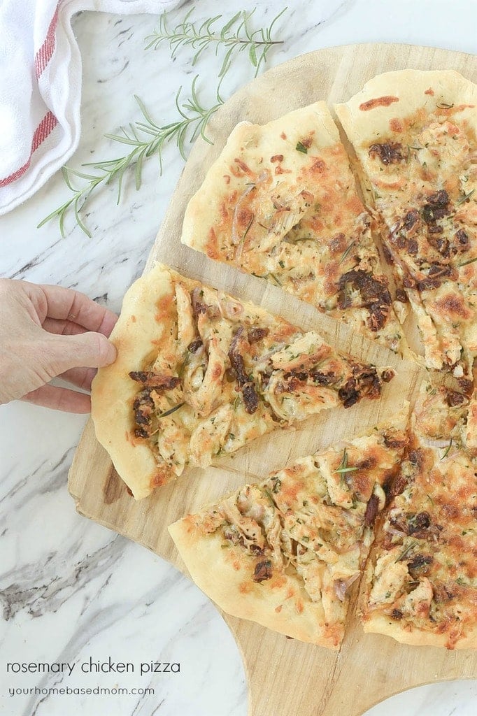 sliced Rosemary Chicken Pizza on pizza peel