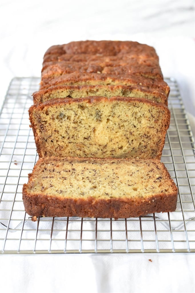 best banana bread sliced on cooling rack