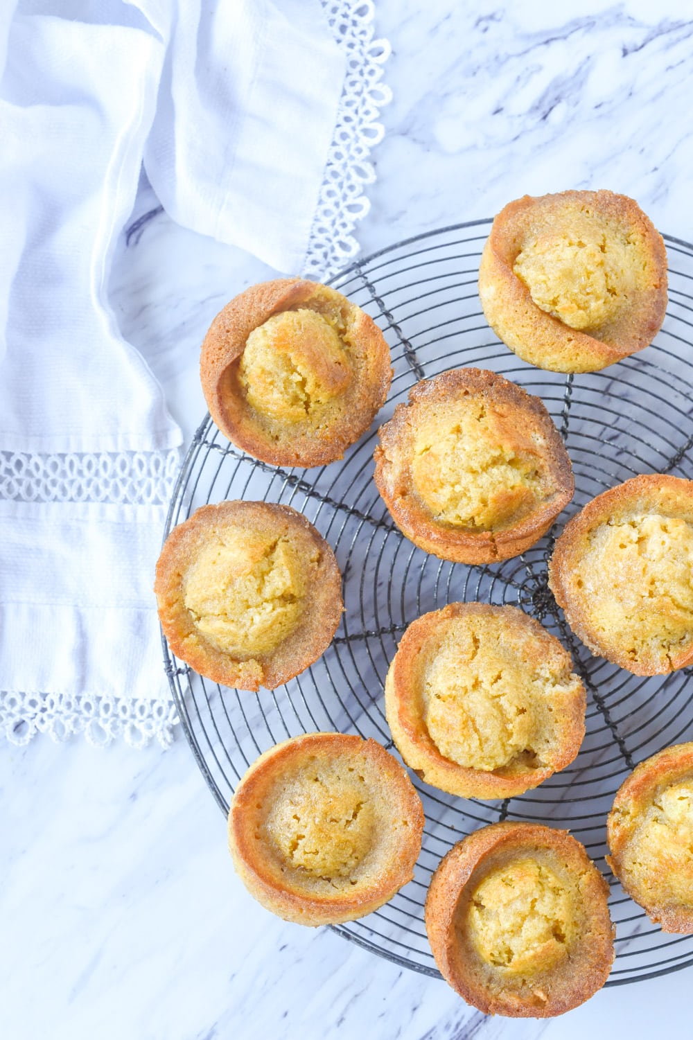 overhead shot of marmalade muffins on a cooling rack