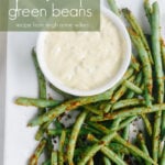 plate of green beans with dipping sauce