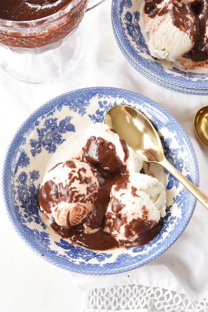 overhead shot of bowl of ice cream and hot fudge sauce