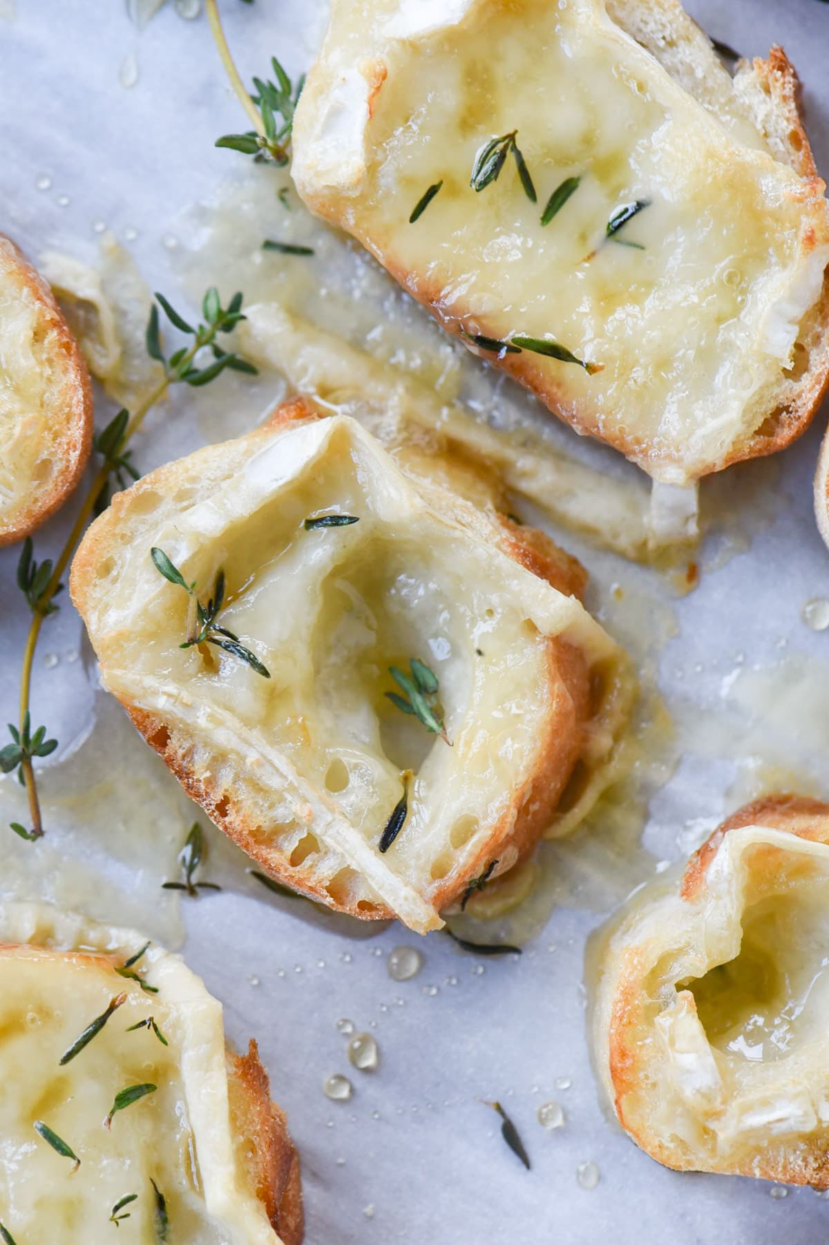 closeup of brie melted on toast