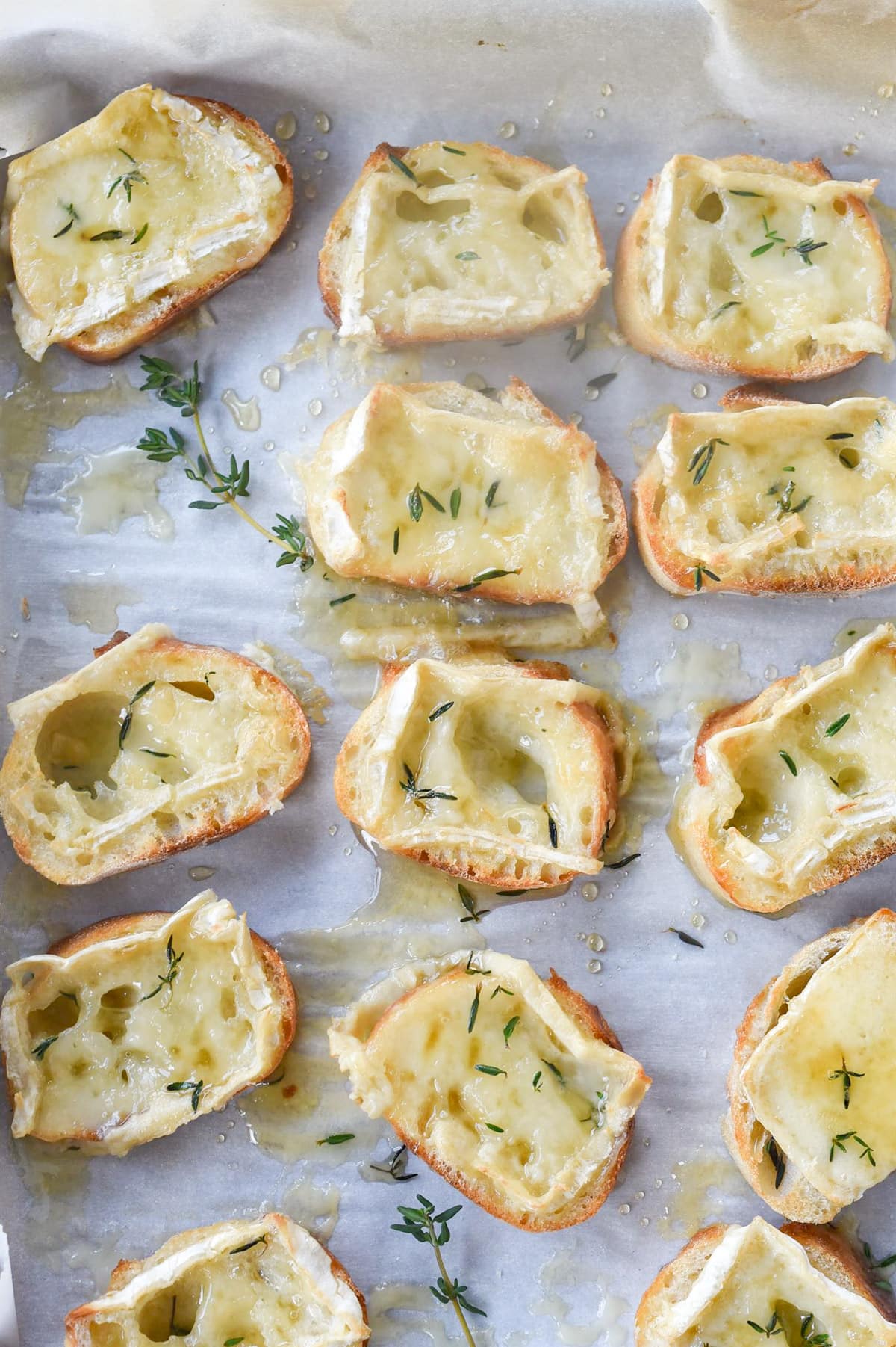 Slices of bread with cheese on top