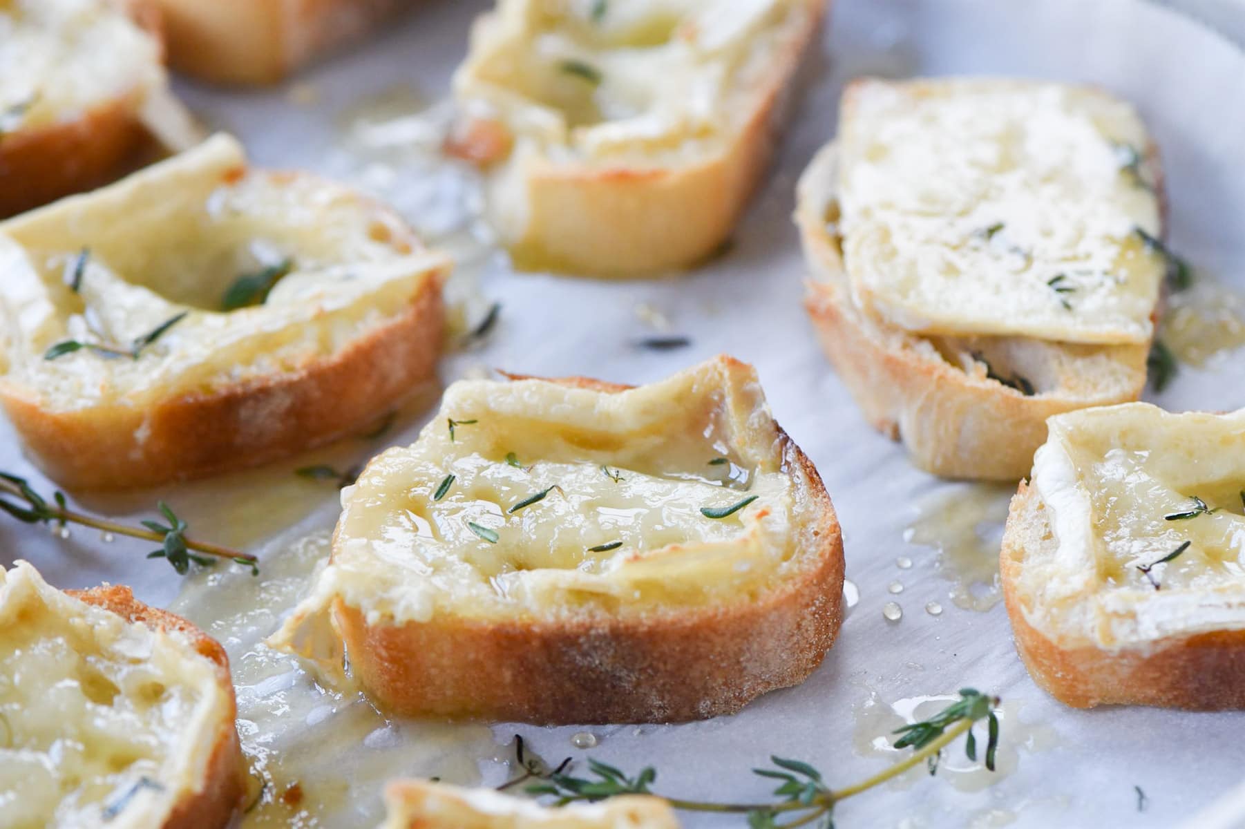 bread with cheese on parchment paper