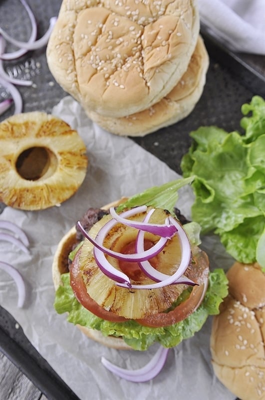 burger topped with grilled pineapple