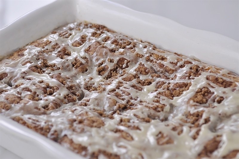 Cinnamon Bun Cake with powdered sugar drizzle.