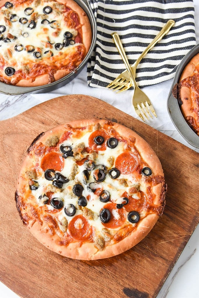 Deep Dish Pizza on a cutting board