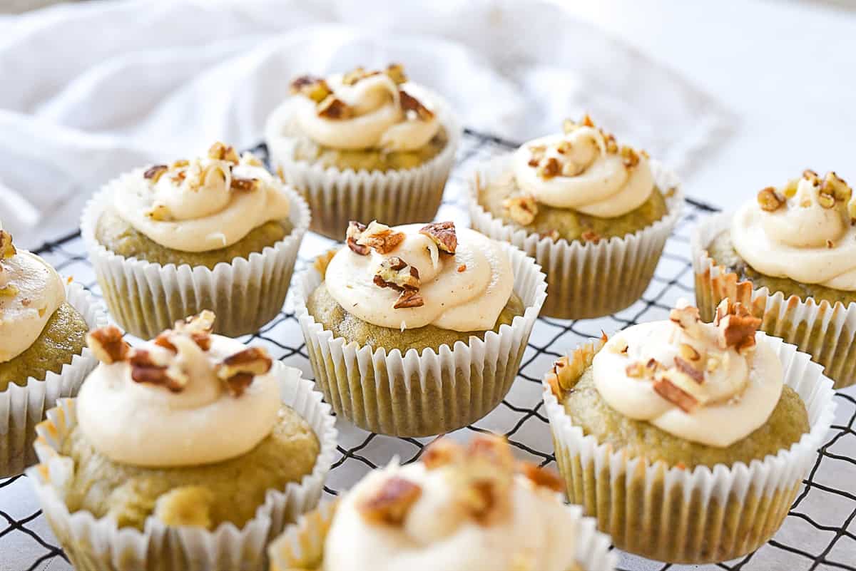 banana cupcakes with pecans on top