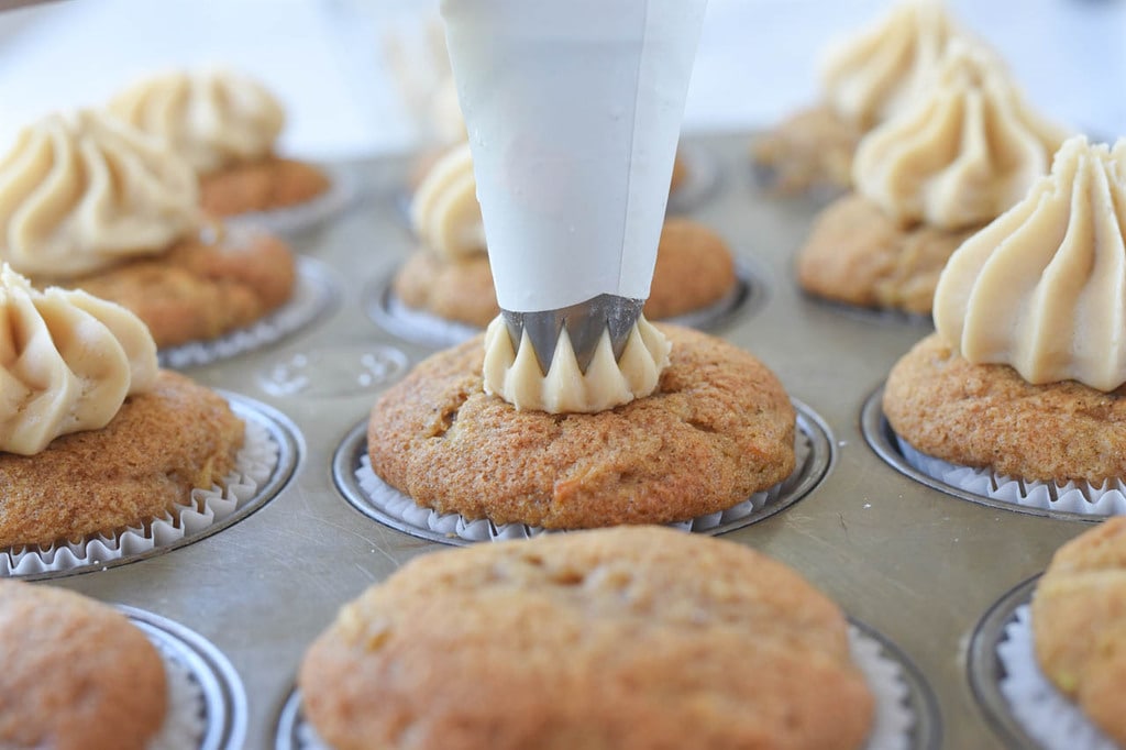 frosting zucchini cupcakes with caramel frosting