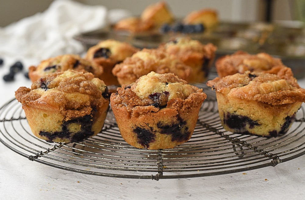 Blueberry Muffins with Streusel muffins on a cooling rack