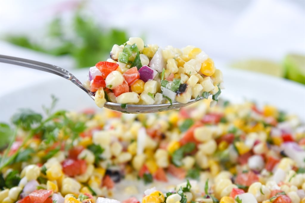 spoon full of corn salad