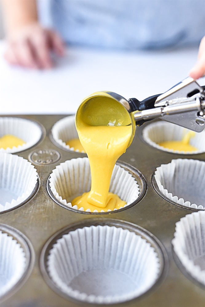 scooping yellow batter