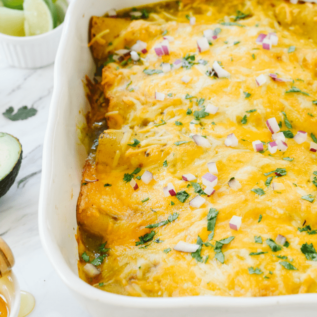 honey lime chicken enchiladas in a dish