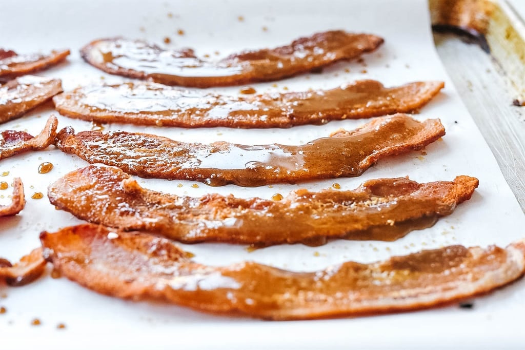 Brown Sugar Bacon on parchment paper