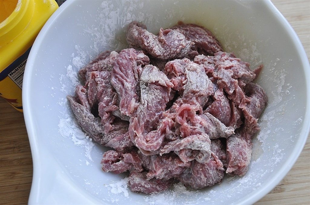 sliced flank stake in corn starch
