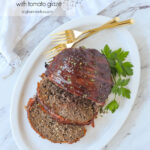 sliced meat loaf on a white plate