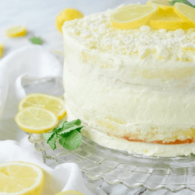 lemon cream cake on a cake stand