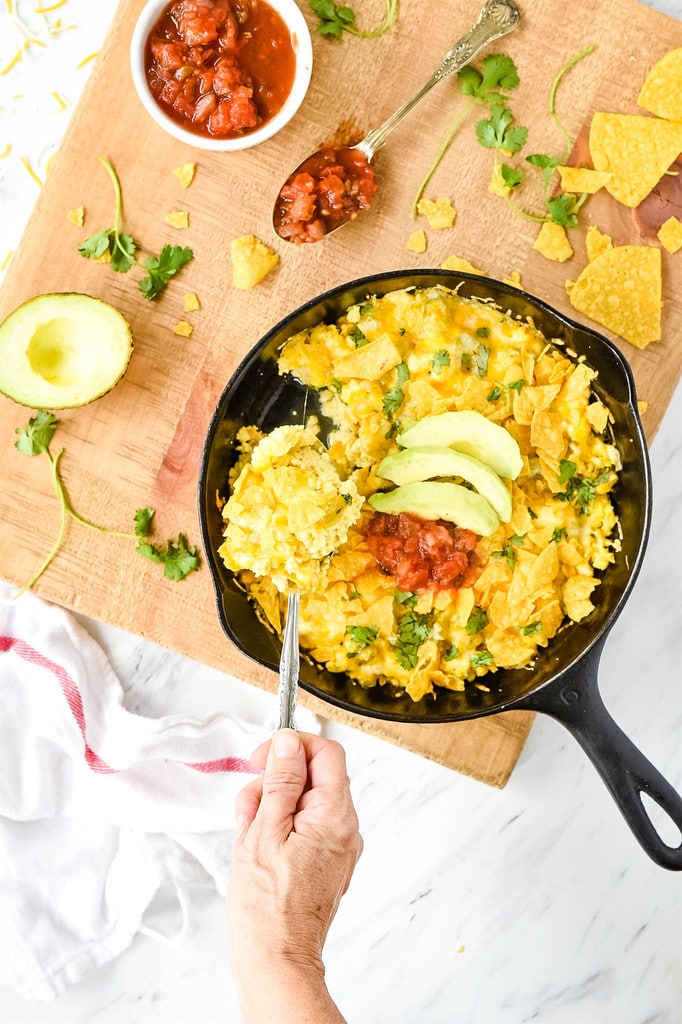 serving Green Chili Egg Casserole with a spoon