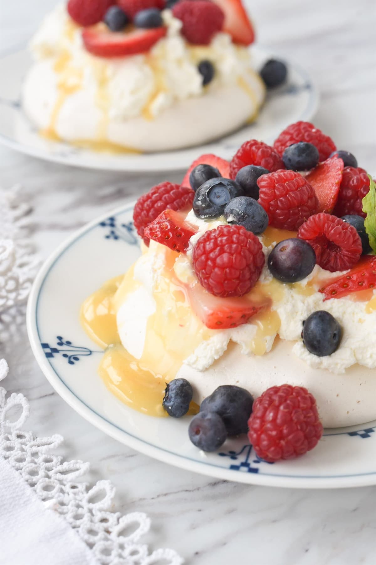 two pavlovas on a plate.