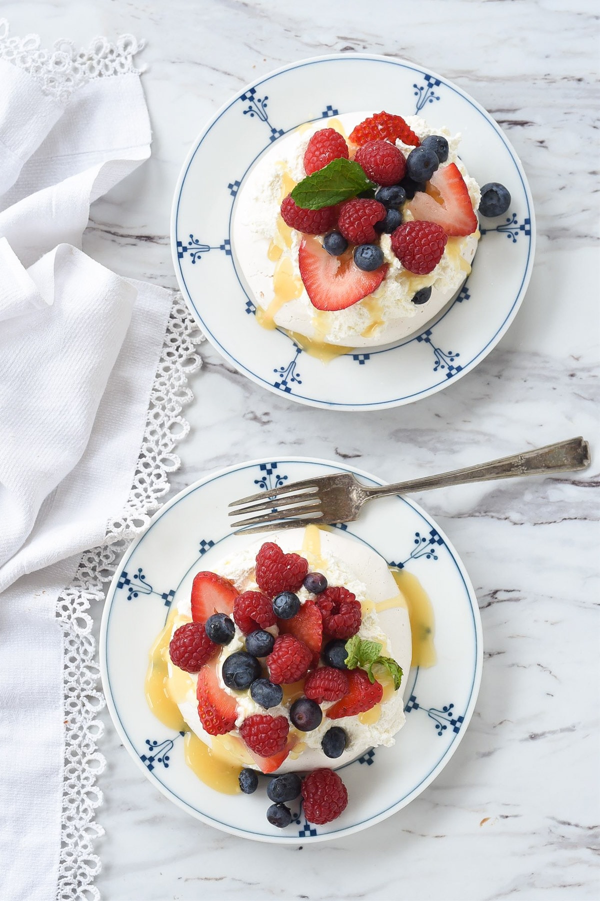 two pavlovas on plates