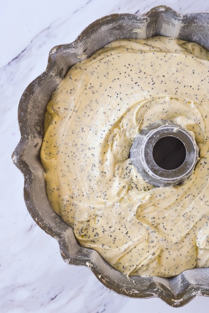 poppy seed cake batter in bundt pan