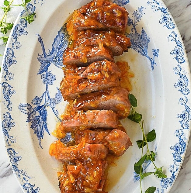 sliced pork tenderloin on a plate