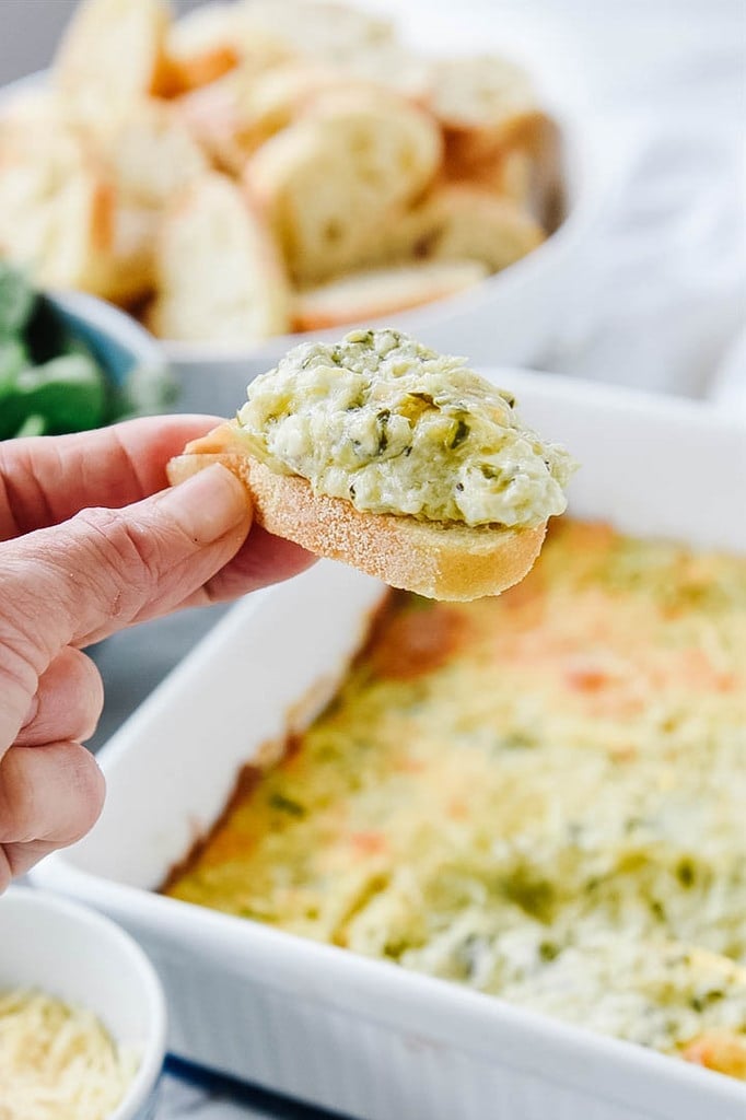 Spinach Artichoke Dip on a baguette