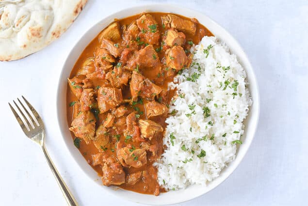 bowl of rice and tikka masala