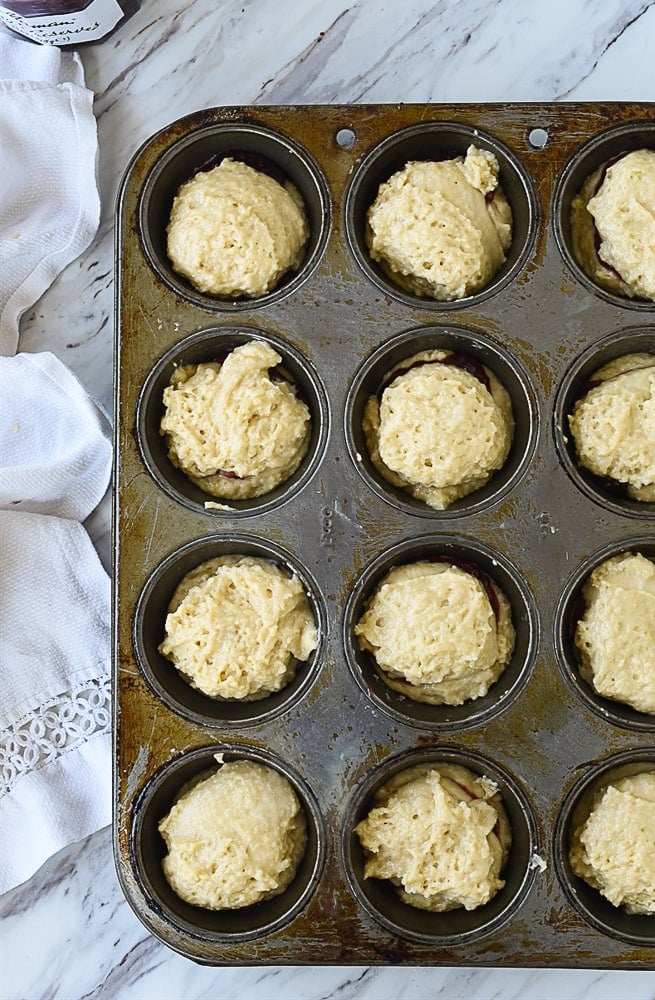 muffin batter in muffin tin