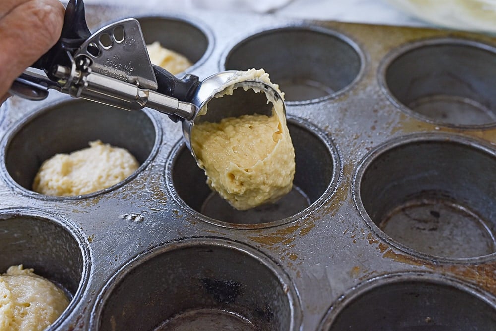filling muffin tins