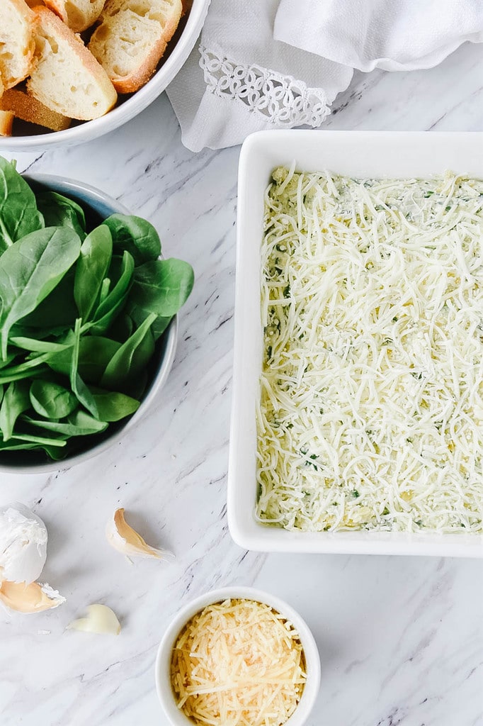 Spinach Artichoke Dip in a white dish