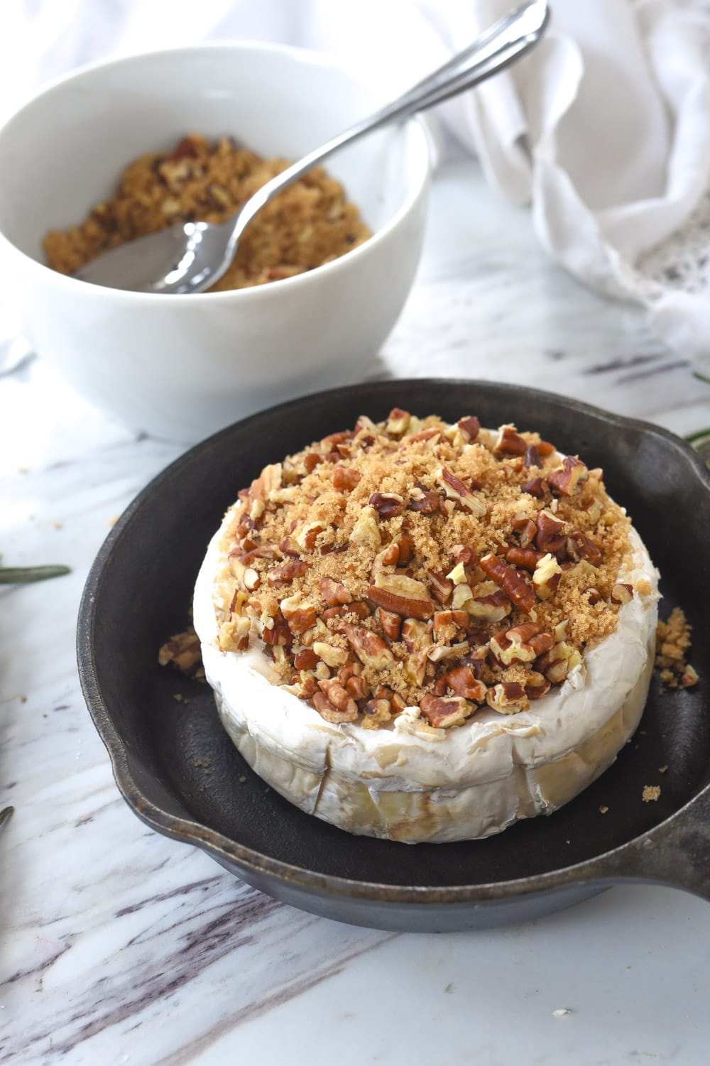 brie filled with brown sugar and pecans