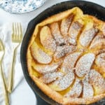 Apple Dutch Baby in a cast iron pan