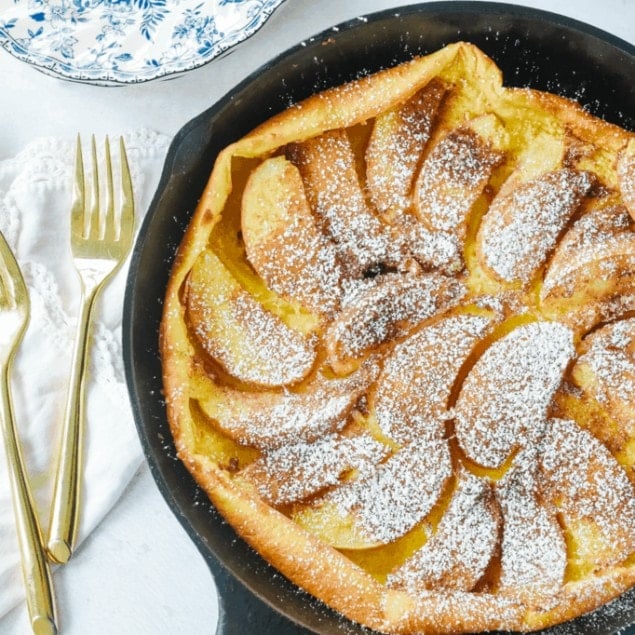 Apple Dutch Baby in a cast iron pan