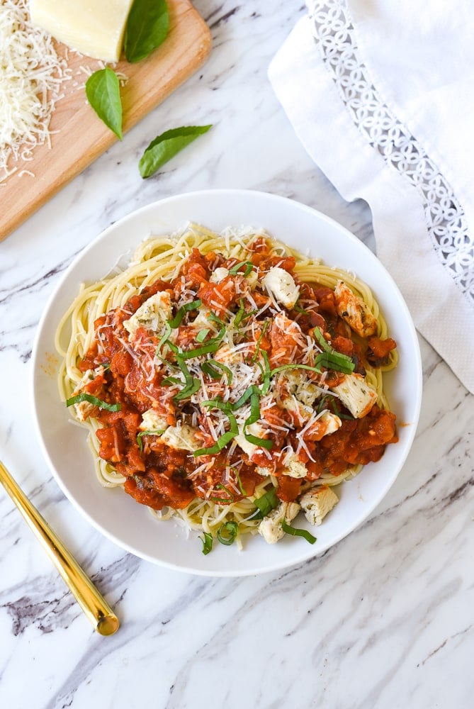 overhead shot of bowl of chicken spaghetti with red sauce