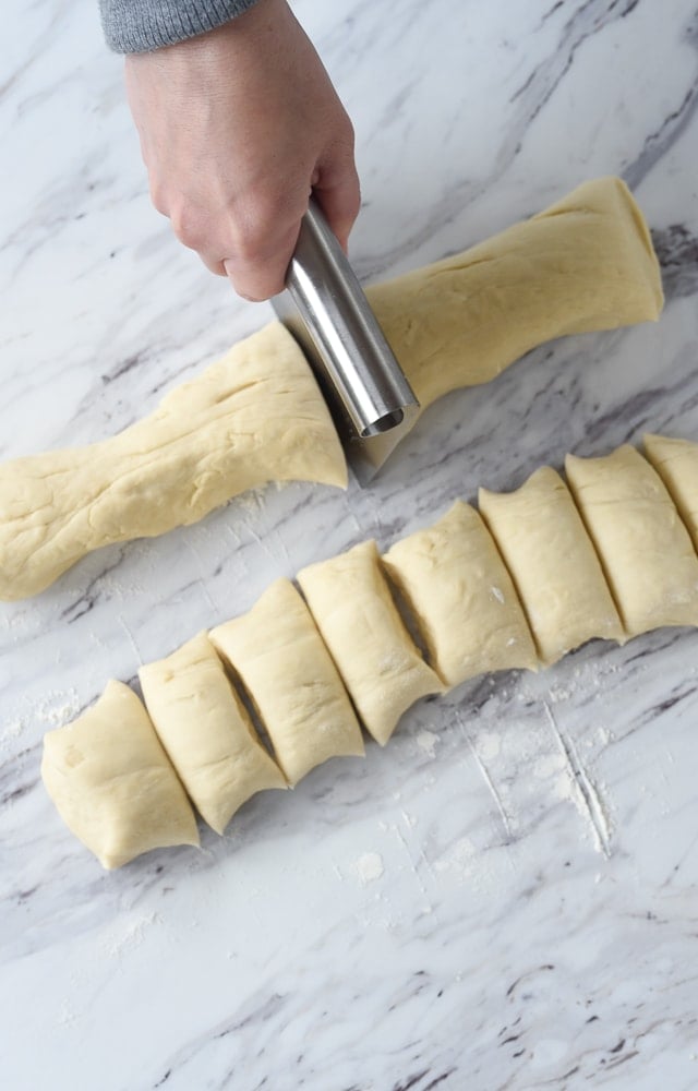 cutting breadstick dough