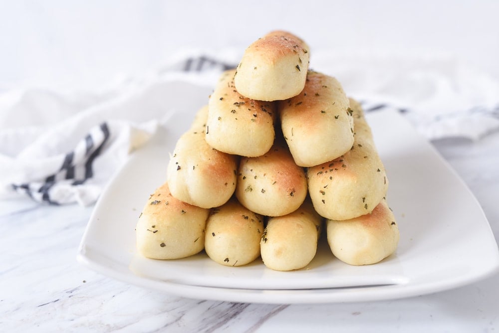 side view of a pile of breadsticks