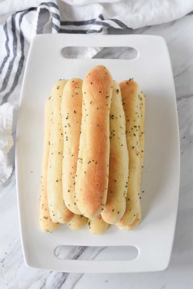 overhead shot of a pile of olive garden breadsticks