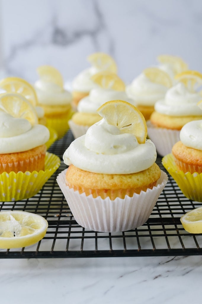 Lemon curd cupcake garnished with a lemon slice