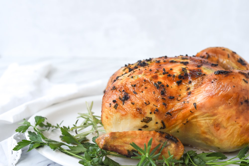 side view of roasted whole chicken