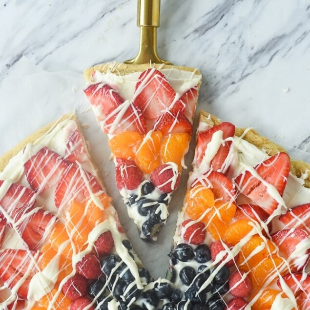slice of fruit pizza on a spatula