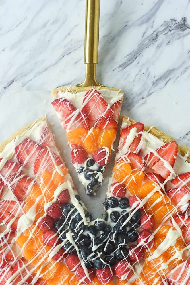 slice of fruit pizza on a spatula