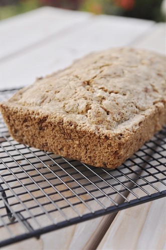 loaf of zucchini bread on a cooling rack