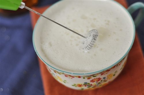 mug of milk with a frother