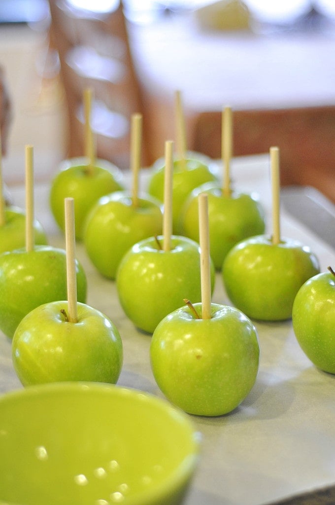 green apples on a stick