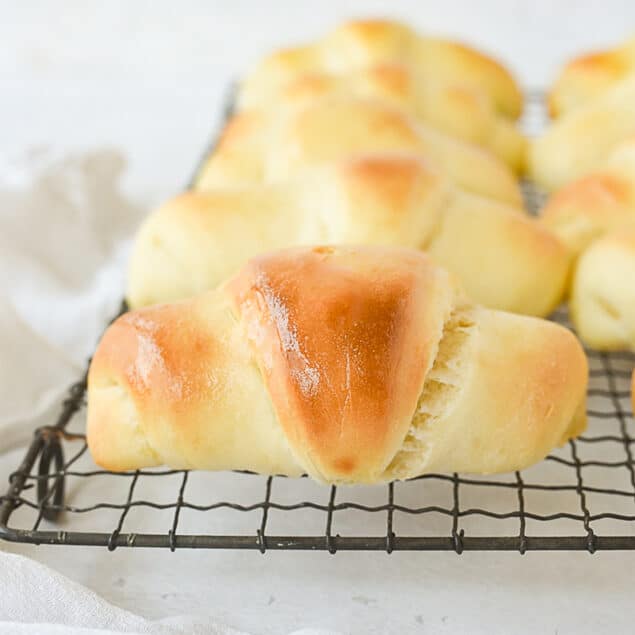 crescent rolls on a cooling rack