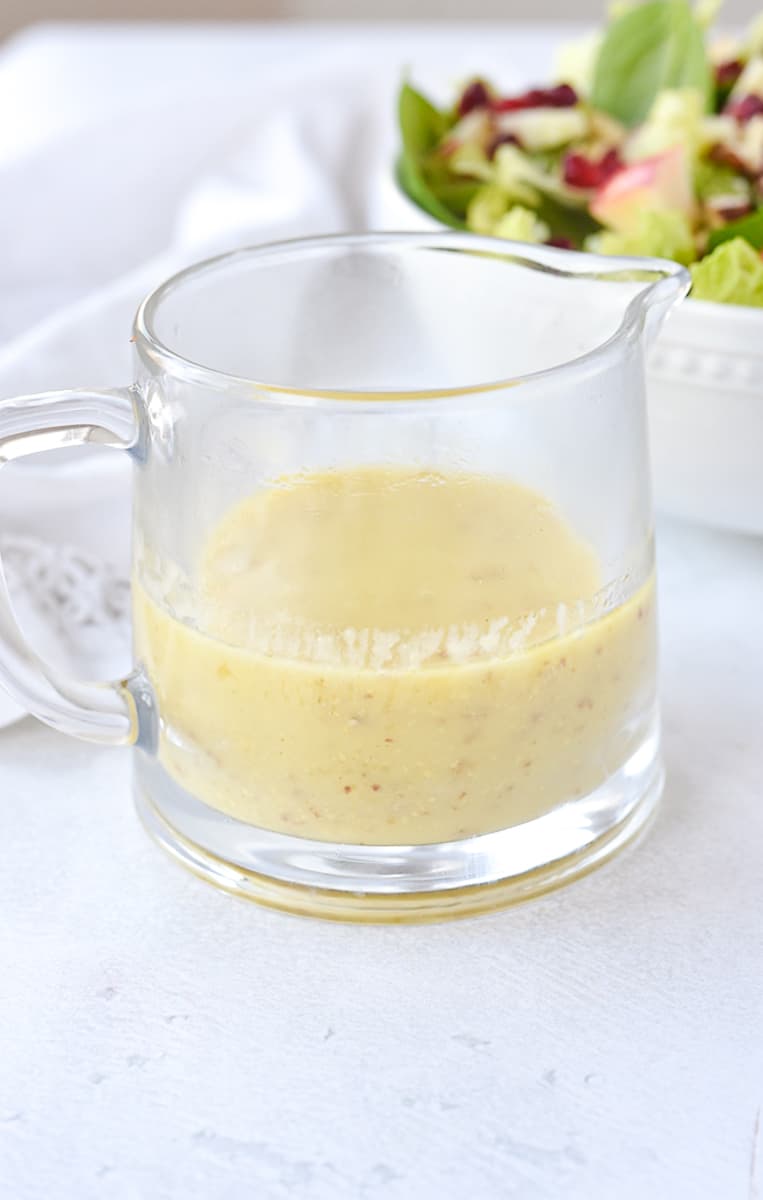 container of lemon dijon dressing