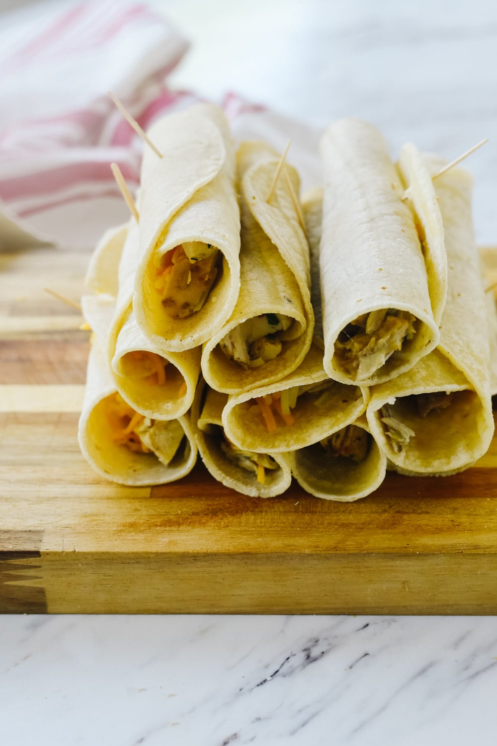 rolled taquitos ready to cook